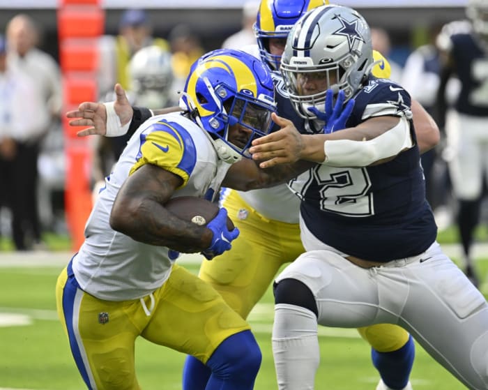 Los Angeles Rams running back Cam Akers (3) is tackled by Dallas Cowboys defensive tackle Trysten Hill (72). Mandatory Credit: Robert Hanashiro-USA TODAY